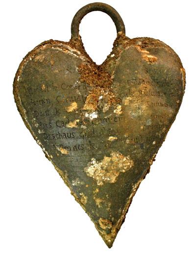 LEAD COFFINS AND HEARTS 